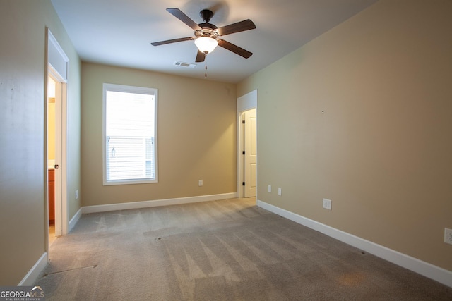 3508 Blue Spruce Ct SW, Gainesville, GA 30504 - spare room with ceiling fan, light colored carpet, and baseboards