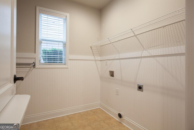 3508 Blue Spruce Ct SW, Gainesville, GA 30504 - laundry area with electric dryer hookup, a wainscoted wall, hookup for a washing machine, and baseboards