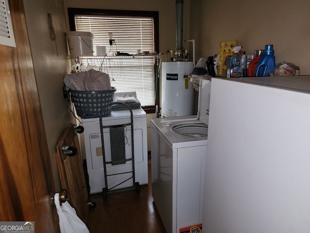 3976 Mosley Dr, Columbus, GA 31903 - laundry area with water heater, washer and dryer, and wood finished floors