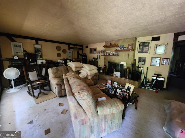 3976 Mosley Dr, Columbus, GA 31903 - carpeted living area with a textured ceiling
