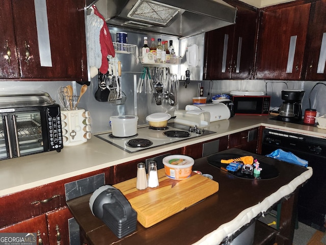 3976 Mosley Dr, Columbus, GA 31903 - kitchen with black appliances, extractor fan, light countertops, and reddish brown cabinets
