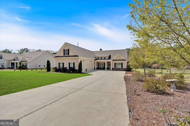 modern inspired farmhouse with driveway and a front lawn