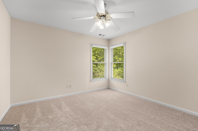 679 Gold Valley Pass, Canton, GA 30114 - empty room featuring carpet floors, baseboards, a ceiling fan, and visible vents