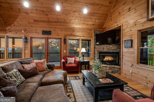 433 Spruce Cir, Mineral Bluff, GA 30559 - living area featuring a fireplace, high vaulted ceiling, wood walls, recessed lighting, and wood finished floors