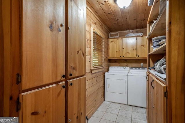 433 Spruce Cir, Mineral Bluff, GA 30559 - clothes washing area with independent washer and dryer, wood walls, cabinet space, light tile patterned floors, and wooden ceiling