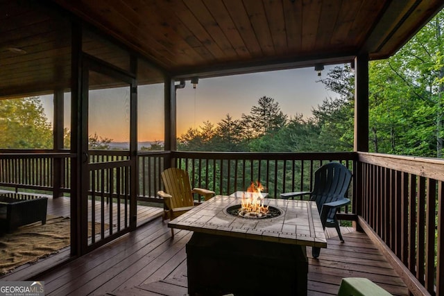 433 Spruce Cir, Mineral Bluff, GA 30559 - wooden deck featuring an outdoor fire pit
