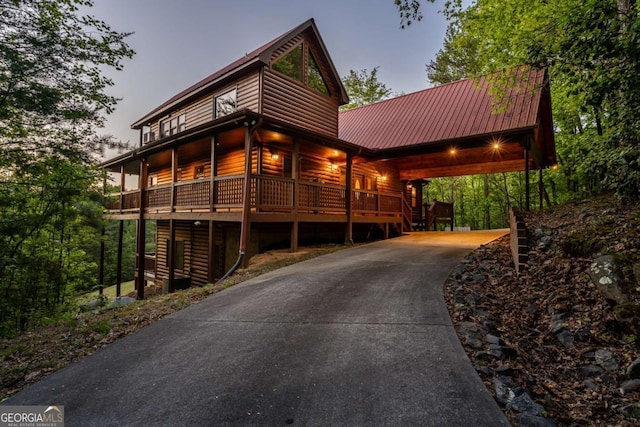 433 Spruce Cir, Mineral Bluff, GA 30559 - exterior space with driveway, metal roof, a deck, a carport, and faux log siding