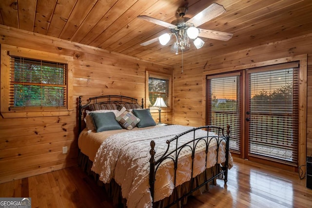 433 Spruce Cir, Mineral Bluff, GA 30559 - bedroom featuring wood walls, wood ceiling, and hardwood / wood-style flooring