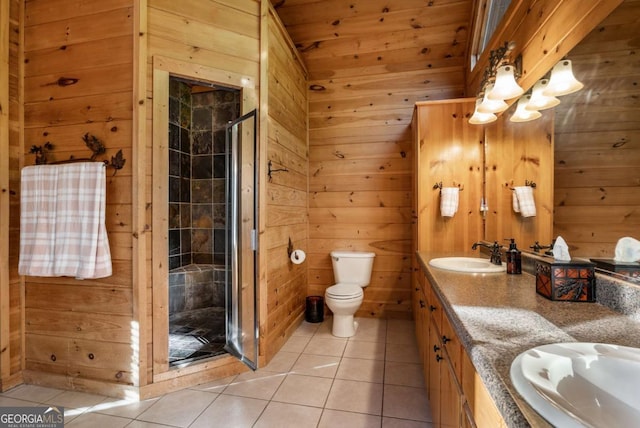 433 Spruce Cir, Mineral Bluff, GA 30559 - full bath with tile patterned flooring, a stall shower, a sink, toilet, and wooden walls
