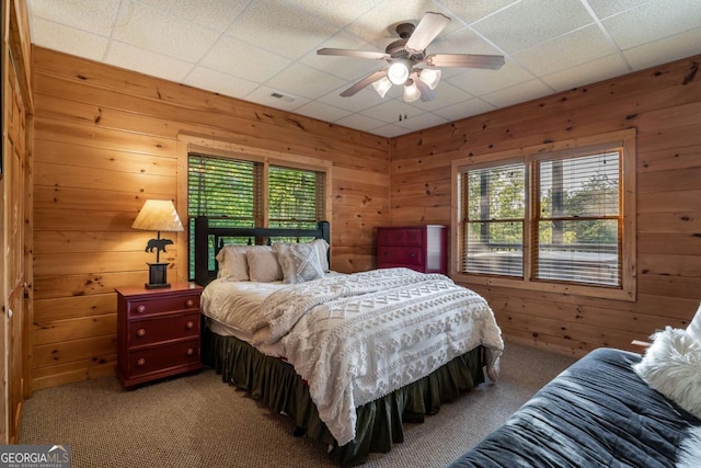 433 Spruce Cir, Mineral Bluff, GA 30559 - bedroom featuring carpet, wooden walls, and multiple windows