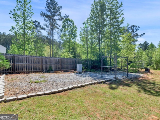 view of yard with a fenced backyard and a patio area