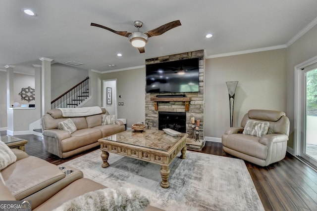 6413 Maple Park Ln, Hoschton, GA 30548 - living area featuring baseboards, a ceiling fan, a stone fireplace, and dark wood-type flooring