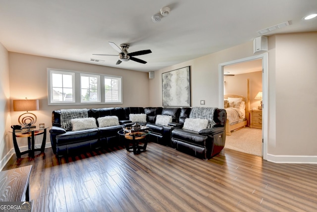 6413 Maple Park Ln, Hoschton, GA 30548 - living room featuring visible vents, a ceiling fan, and wood finished floors
