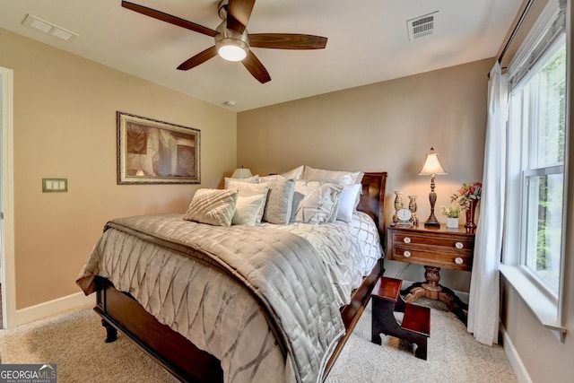 6413 Maple Park Ln, Hoschton, GA 30548 - bedroom featuring baseboards, ceiling fan, light colored carpet, and visible vents