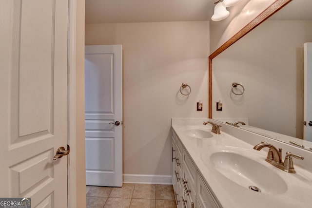 6413 Maple Park Ln, Hoschton, GA 30548 - full bath featuring a sink, baseboards, tile patterned flooring, and double vanity