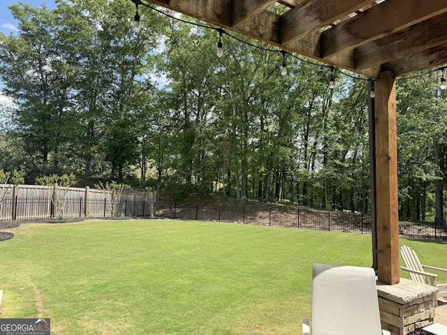 view of yard with fence