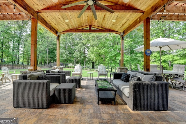 6413 Maple Park Ln, Hoschton, GA 30548 - view of patio with fence, an outdoor living space, a ceiling fan, and outdoor dining space