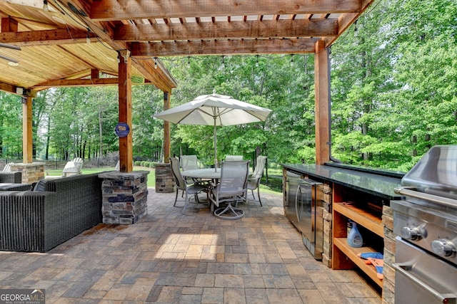 6413 Maple Park Ln, Hoschton, GA 30548 - view of patio / terrace featuring outdoor dining area, exterior kitchen, and area for grilling