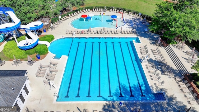 6413 Maple Park Ln, Hoschton, GA 30548 - community pool featuring a water slide