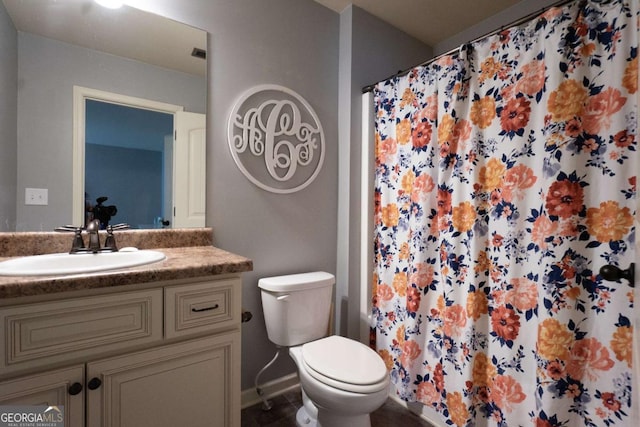 full bath with tile patterned flooring, vanity, baseboards, toilet, and a shower with shower curtain