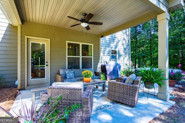 view of patio with grilling area, outdoor lounge area, and a ceiling fan