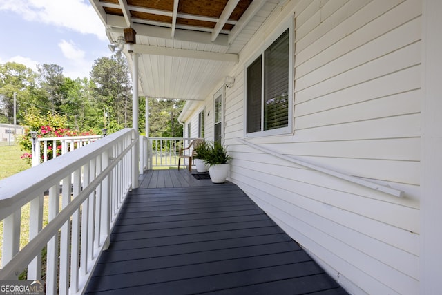 wooden deck featuring covered porch