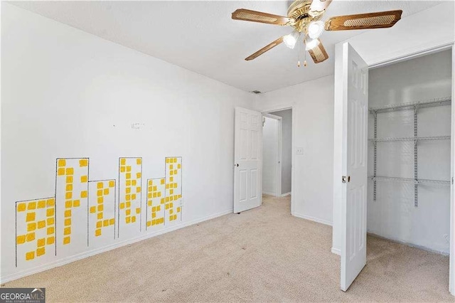 unfurnished bedroom featuring a closet, carpet, and baseboards