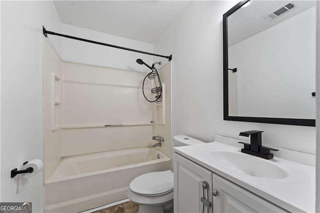 bathroom featuring vanity, toilet, a textured ceiling, shower / bath combination, and visible vents