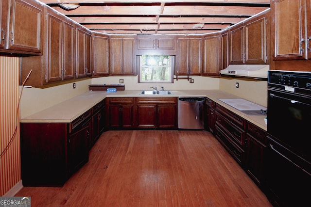 110 Vistacrest Way, Roswell, GA 30075 - kitchen featuring stainless steel dishwasher, wood finished floors, a sink, light countertops, and ventilation hood