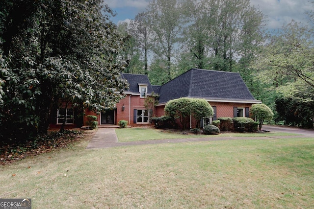 110 Vistacrest Way, Roswell, GA 30075 - exterior space featuring roof with shingles, a yard, mansard roof, and brick siding