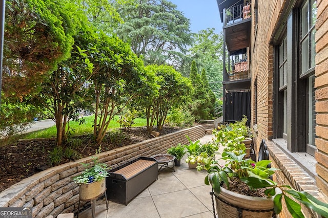 view of patio with a balcony