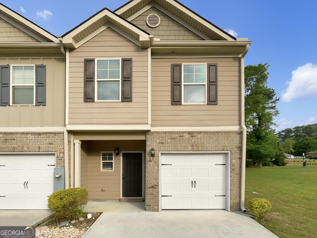 6001 Oak Bend Ct, Riverdale, GA 30296 - view of property with an attached garage, brick siding, a front yard, and driveway