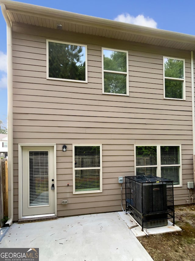 6001 Oak Bend Ct, Riverdale, GA 30296 - rear view of house featuring a patio