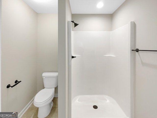 6001 Oak Bend Ct, Riverdale, GA 30296 - bathroom featuring a stall shower and tile patterned flooring