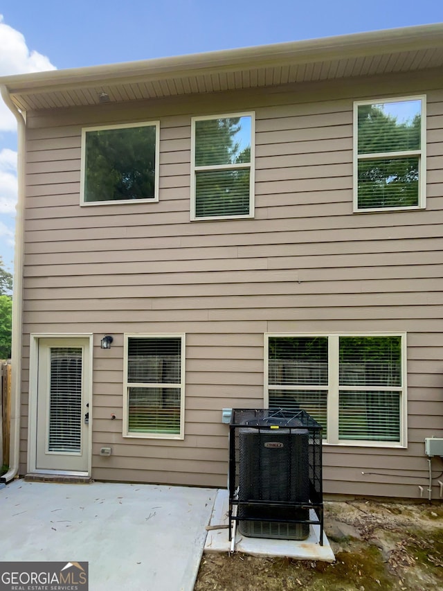 6001 Oak Bend Ct, Riverdale, GA 30296 - rear view of house featuring a patio