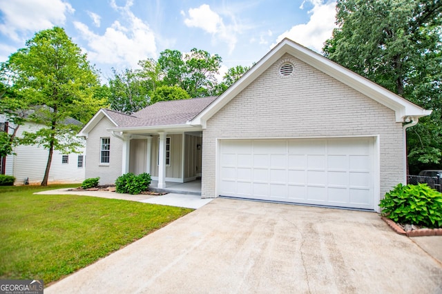 ranch-style house with an attached garage, a front lawn, brick siding, a porch, and driveway