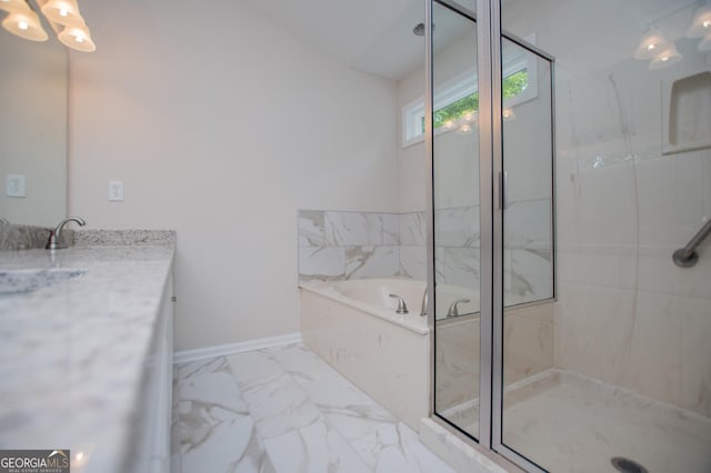 full bath with vanity, a chandelier, a marble finish shower, marble finish floor, and a bath