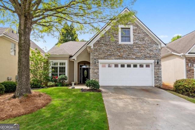 view of front of property featuring concrete driveway, a front yard, stone siding, and stucco siding