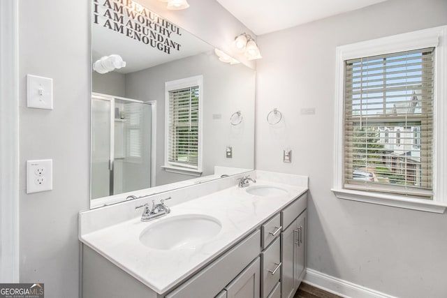 7762 Fawn Cir, Covington, GA 30014 - full bathroom with double vanity and a shower with door