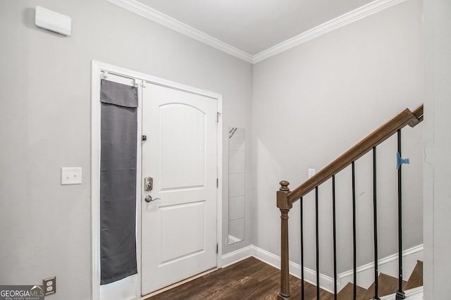 7762 Fawn Cir, Covington, GA 30014 - entrance foyer with crown molding, dark wood-style flooring, and stairs