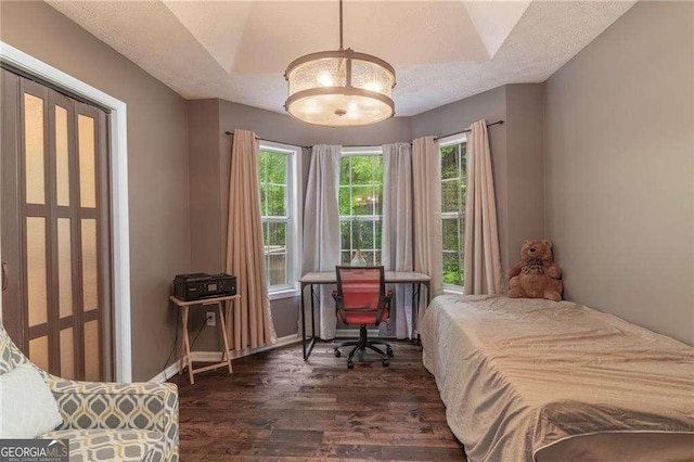 204 Queensbury Ct, Acworth, GA 30102 - bedroom with baseboards and dark wood finished floors