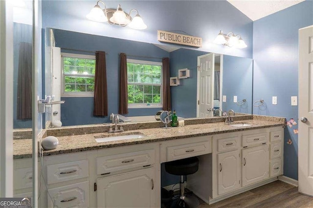204 Queensbury Ct, Acworth, GA 30102 - full bathroom with double vanity, a sink, and wood finished floors
