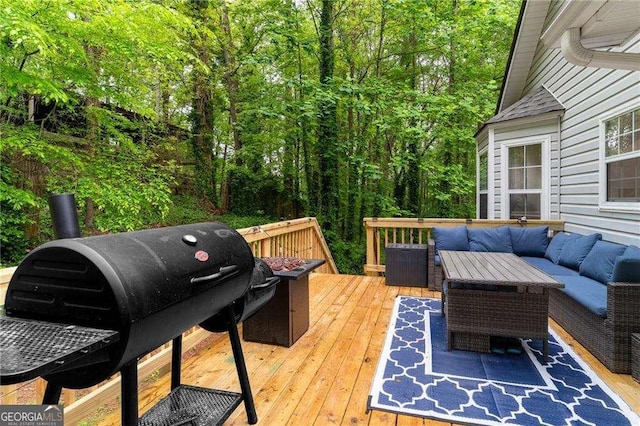204 Queensbury Ct, Acworth, GA 30102 - wooden deck with an outdoor living space and grilling area