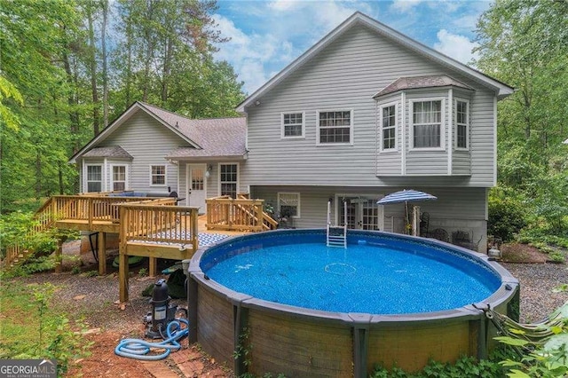 204 Queensbury Ct, Acworth, GA 30102 - back of property with a deck