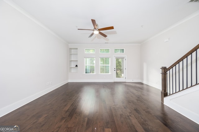 915 Katie Kerr Dr, Decatur, GA 30030 - unfurnished living room featuring ornamental molding, stairway, built in shelves, a ceiling fan, and dark wood finished floors
