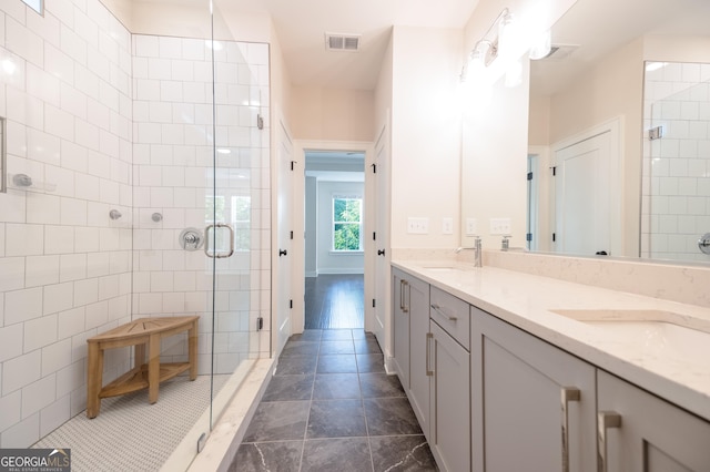 915 Katie Kerr Dr, Decatur, GA 30030 - full bath featuring a sink, a shower stall, double vanity, and visible vents
