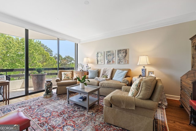 2660 Peachtree Rd Unit 7F, Atlanta, GA 30305 - living area featuring floor to ceiling windows, ornamental molding, and wood finished floors