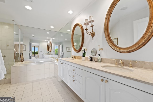 2660 Peachtree Rd Unit 7F, Atlanta, GA 30305 - bathroom featuring a bath, recessed lighting, a sink, and tile patterned flooring