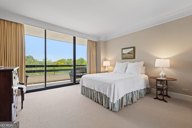 2660 Peachtree Rd Unit 7F, Atlanta, GA 30305 - carpeted bedroom with access to outside, ornamental molding, and baseboards