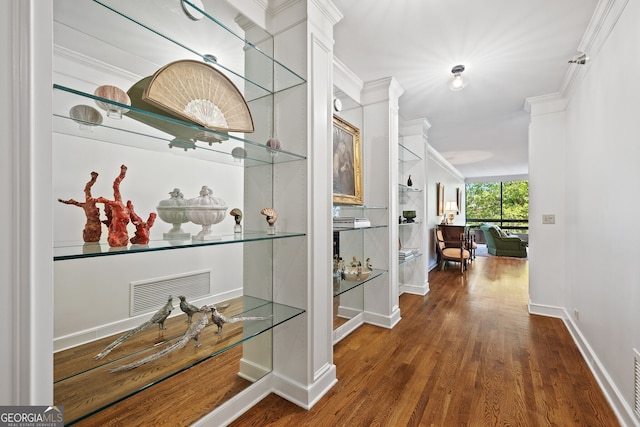 2660 Peachtree Rd Unit 7F, Atlanta, GA 30305 - hall with visible vents, ornamental molding, baseboards, and wood finished floors